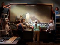 The staff of the Whaling Museum install the Sealers Crushed by Icebergs painting by William Bradford which will be shown in an exhibit at the Whaling Museum in downtown New Bedford.    PETER PEREIRA/THE STANDARD-TIMES/SCMG